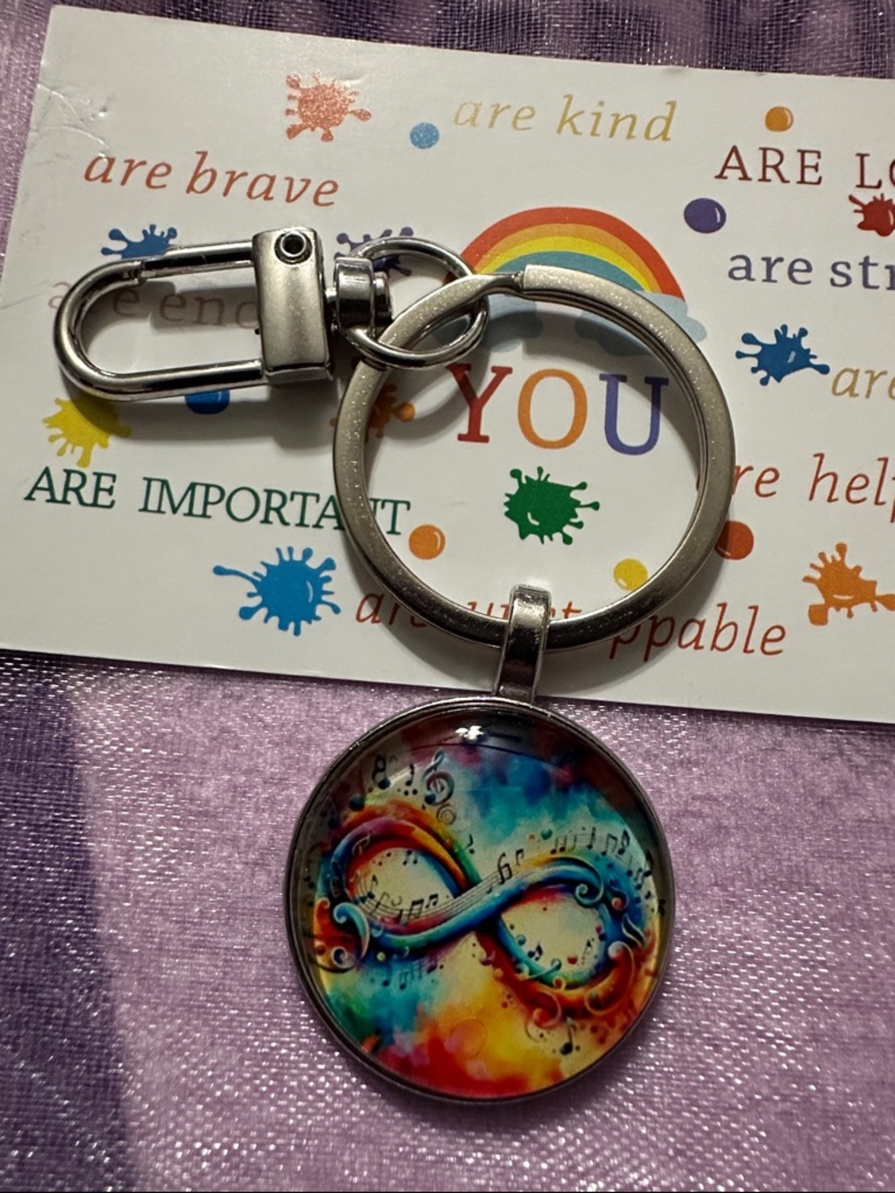 Colorful Rainbow Infinity Bagcharm with  positive affirmation card in sheer bag